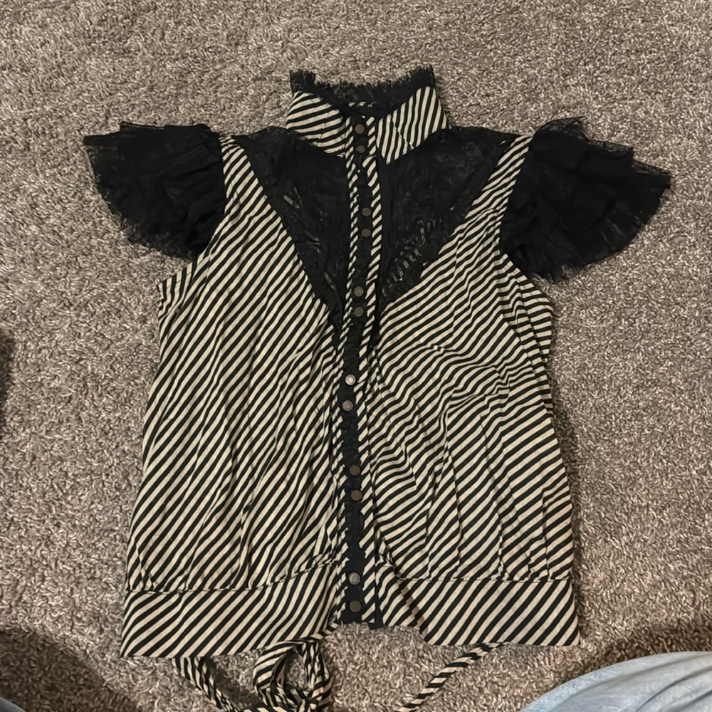 I am not too sure what size this top is